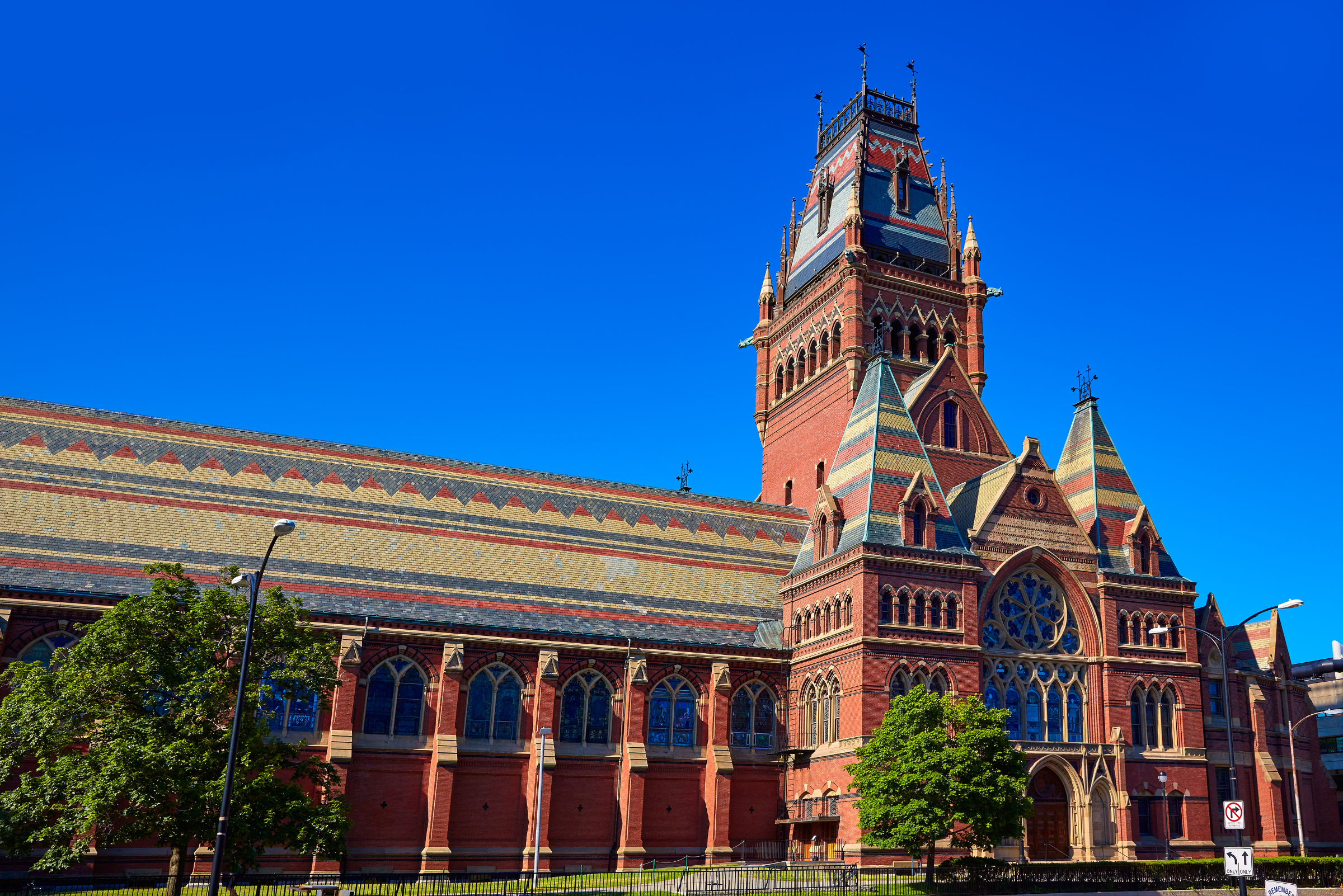 Victorian Gothic Revival brick building with ornate tower