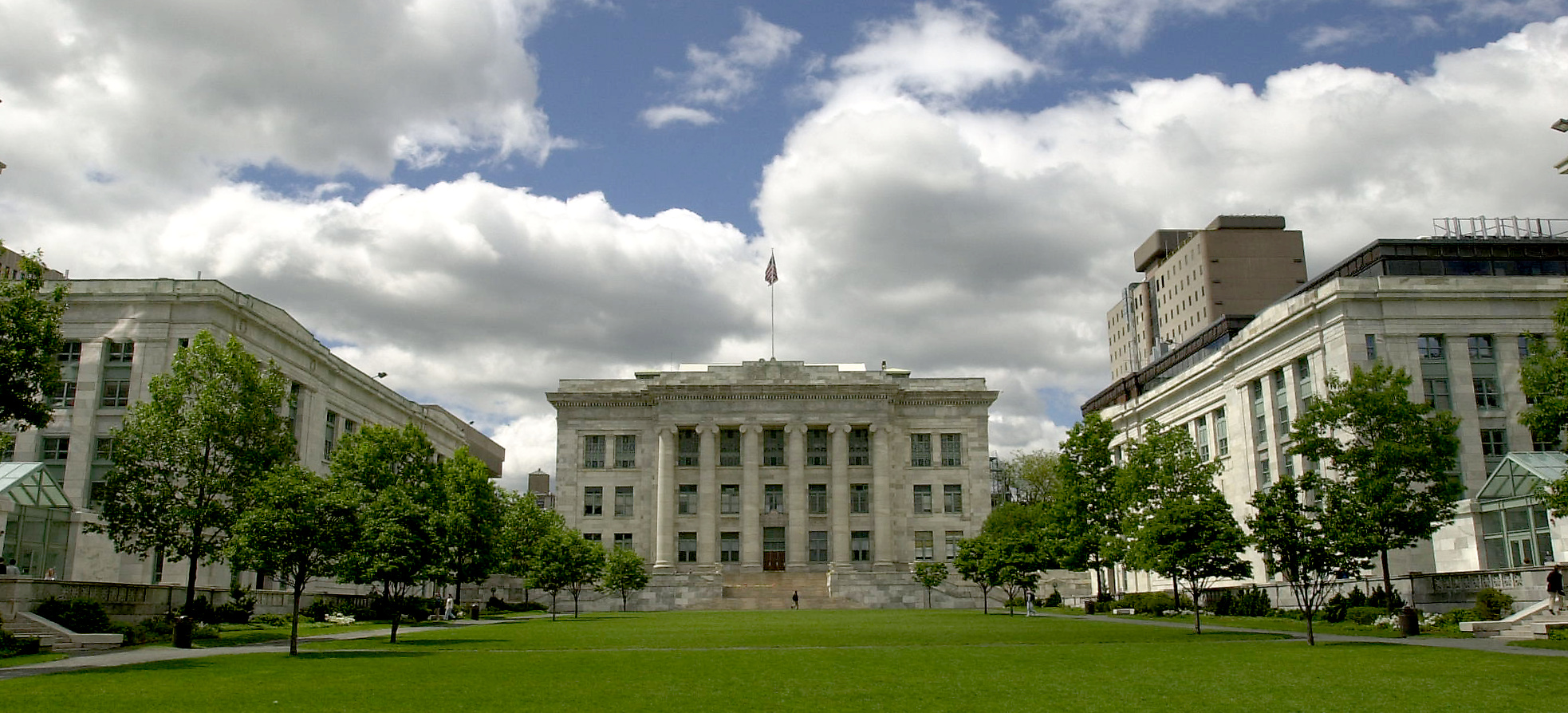 Neoclassical government building with columns on a university campus